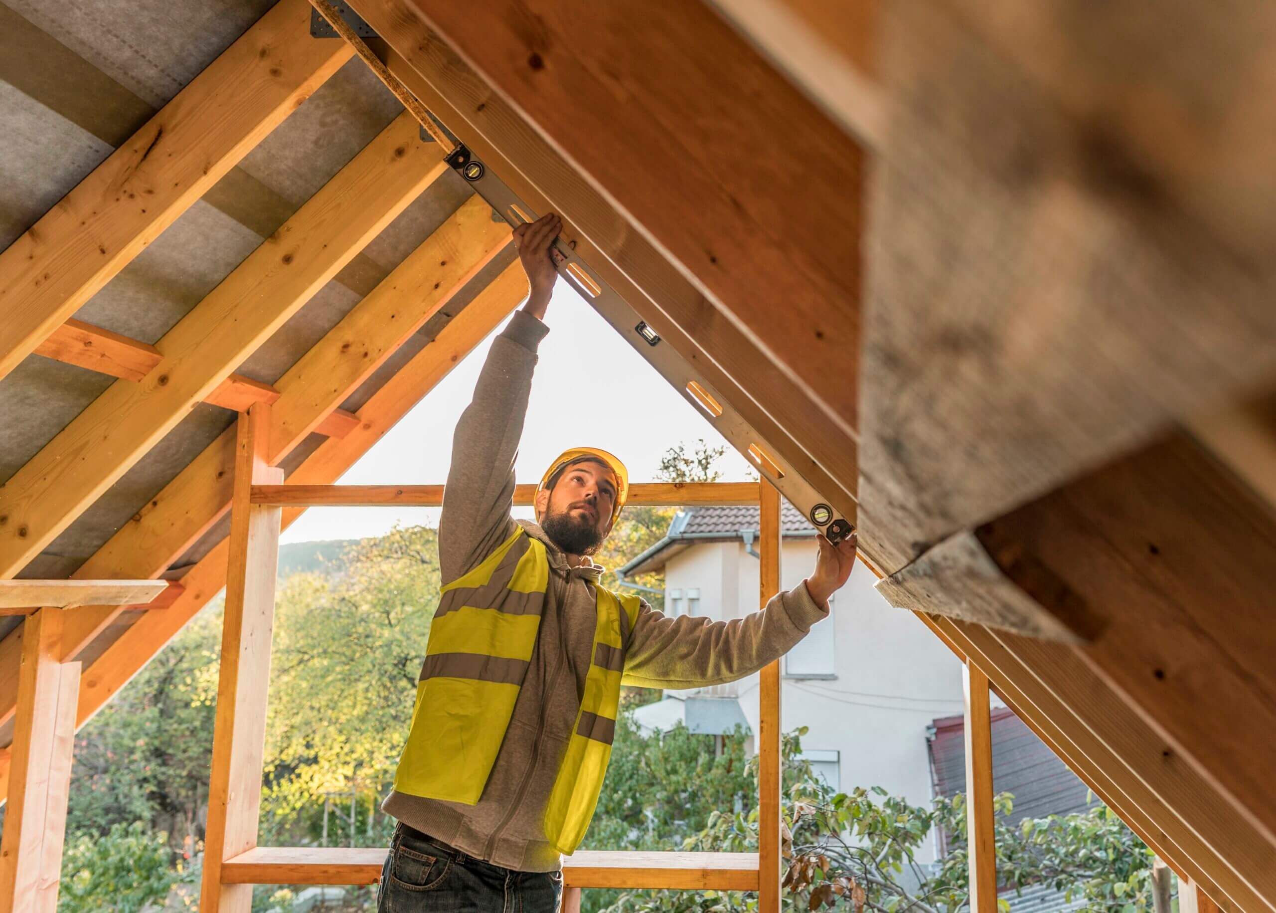 carpenter-man-working-roof-scaled